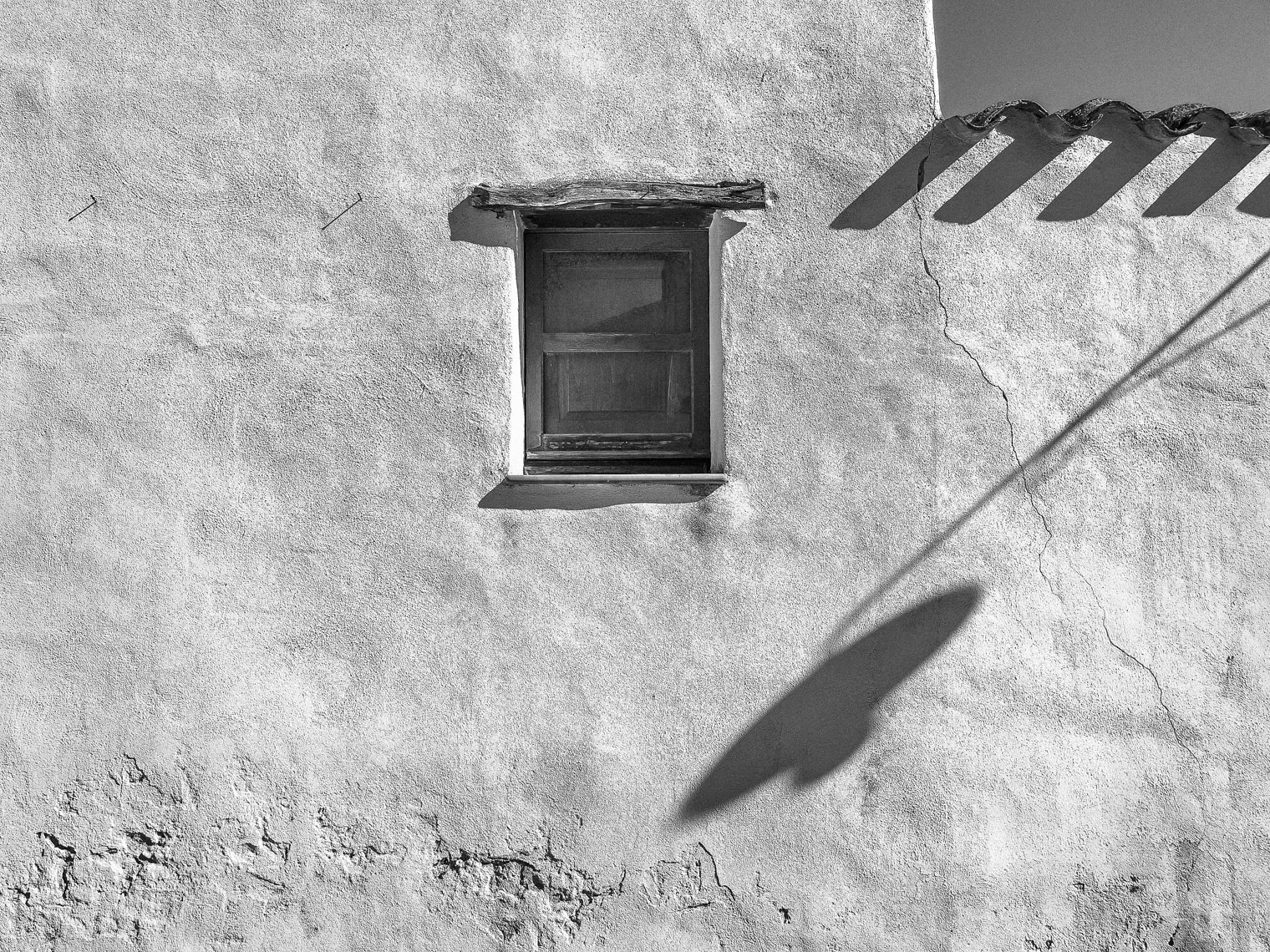 tratalias-vecchia-window-and-lamppole-shadow-print